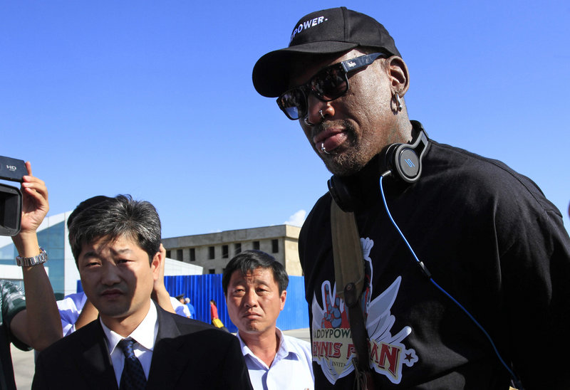 Dennis Rodman arrives at Pyongyang airport in North Korea on Tuesday. Rodman said he plans to hang out with authoritarian leader Kim Jong Un, have a good time and maybe bridge some cultural gaps – but not be a diplomat. He also hopes to start a basketball league there.