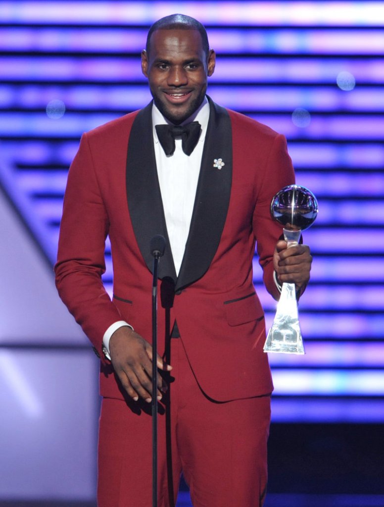 Miami Heat star LeBron James accepts the award for best male athlete at the ESPY Awards in Los Angeles.