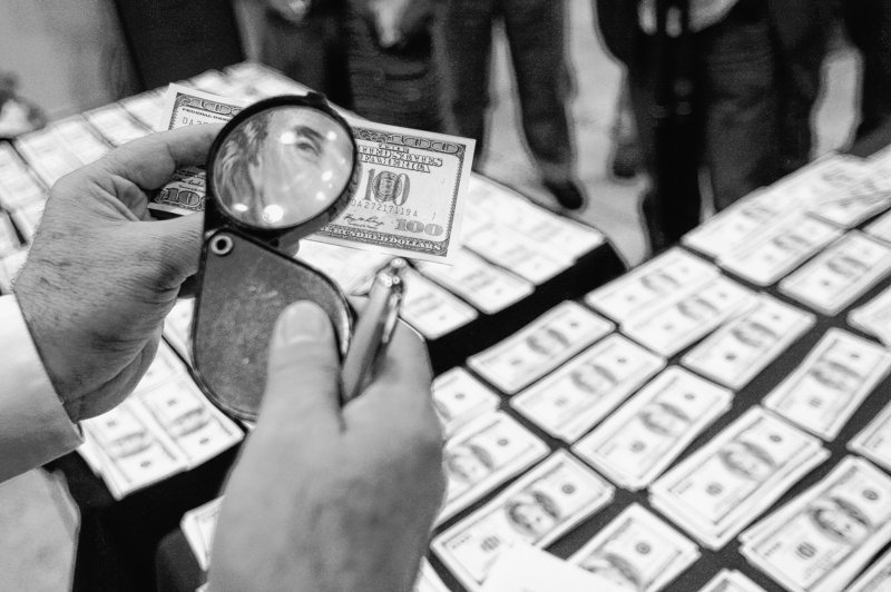 Counterfeiters earn up to $20,000 in real currency for every $100,000 in false bills they produce.