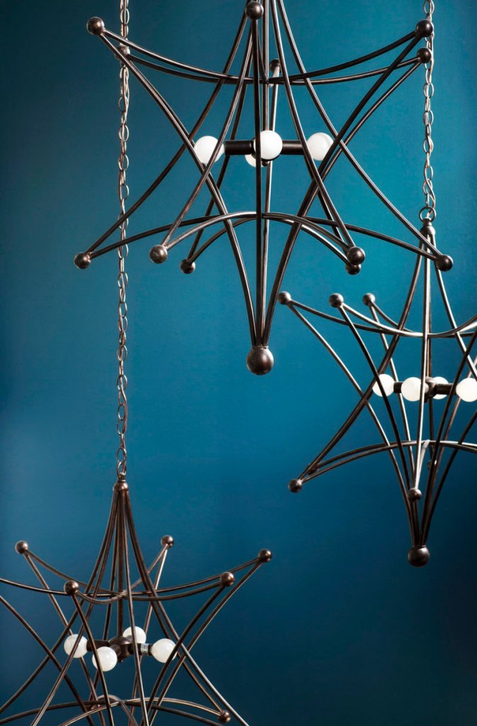 This geometric metal pendant light by Crystorama is a stunning addition to an entryway.