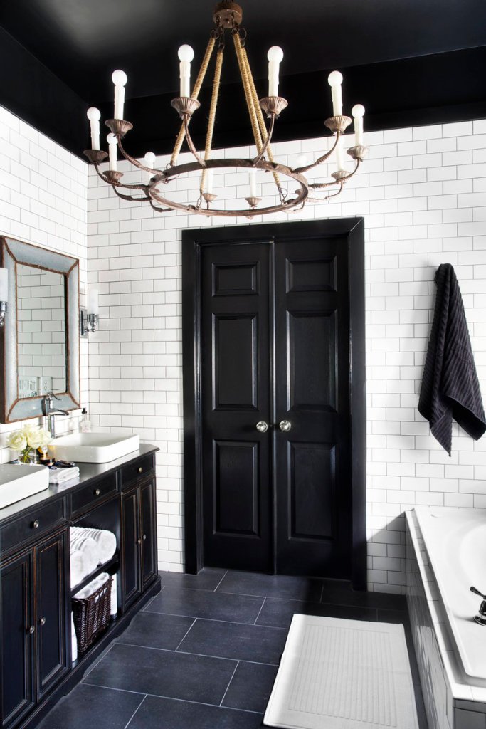 A chandelier brings a decorative and unexpected touch to a normally task-oriented space – the bathroom.