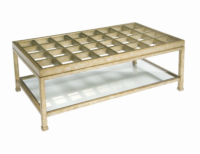 A gilded finish gives Pearson’s 9744 Cocktail Table a feeling of luxury. The glass-topped table has a lower shelf for display.