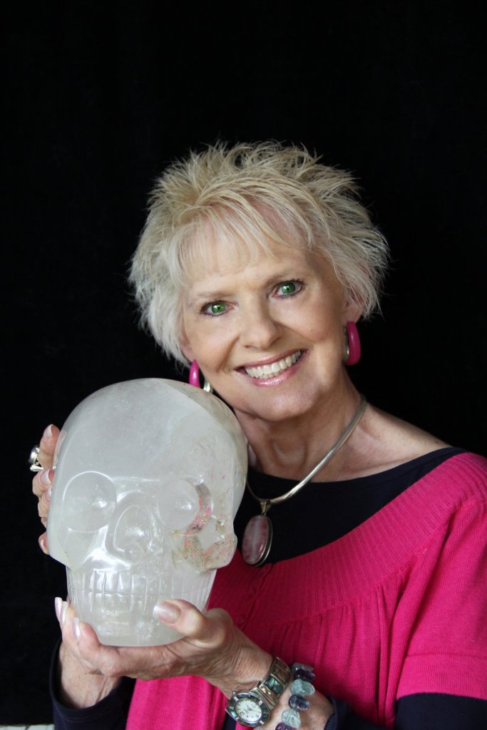 JoAnn Parks of Houston, Texas, brings her crystal skull, Max, to Leapin’ Lizards’ Portland and Freeport stores this weekend.