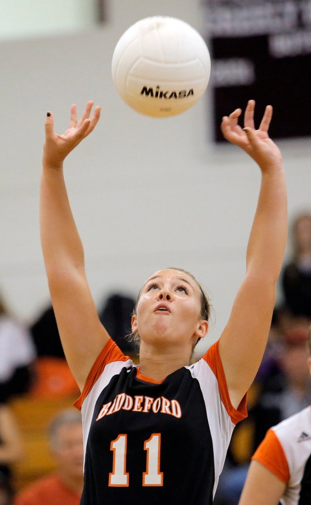 Kayla Fournier of Biddeford keeps her concentration while setting the ball during the match against Greely at Cumberland.