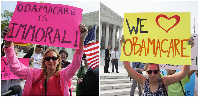 An opponent, left, and a supporter, right, of Obamacare hold placards as they rally in front of the Supreme Court in Washington in March.