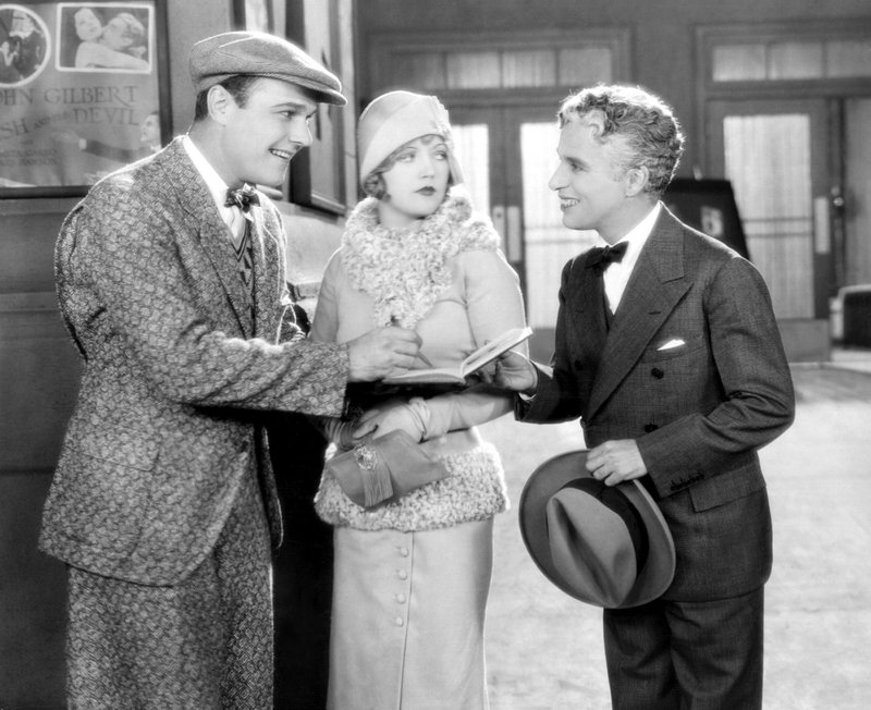 William Haines, left, Marion Davies and Charlie Chaplin in the 1928 silent comedy “Show People.”