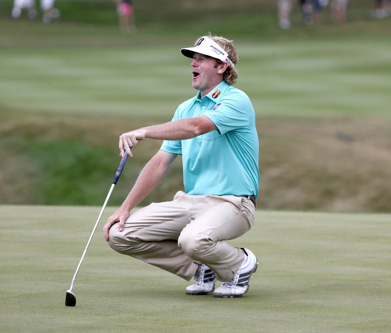 Brandt Snedeker can’t believe it as he misses a putt Thursday at the BMW Championship at Lake Forest, Ill. Tied for third place is Tiger Woods, who trails by three strokes.