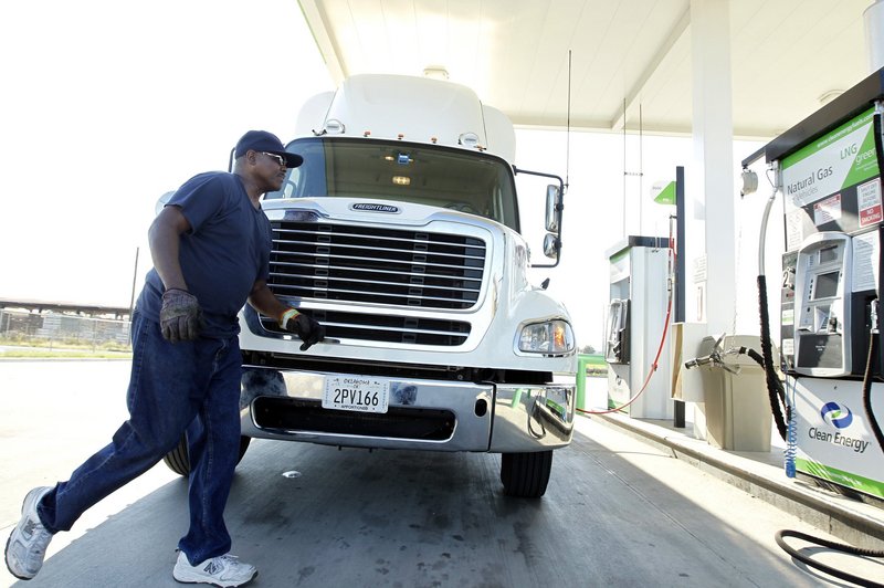 Trucker Gary Smith arrives to fill up at the Clean Energy natural gas station in Dallas, Texas, on September 3. Natural gas is considerably less costly than diesel fuel.