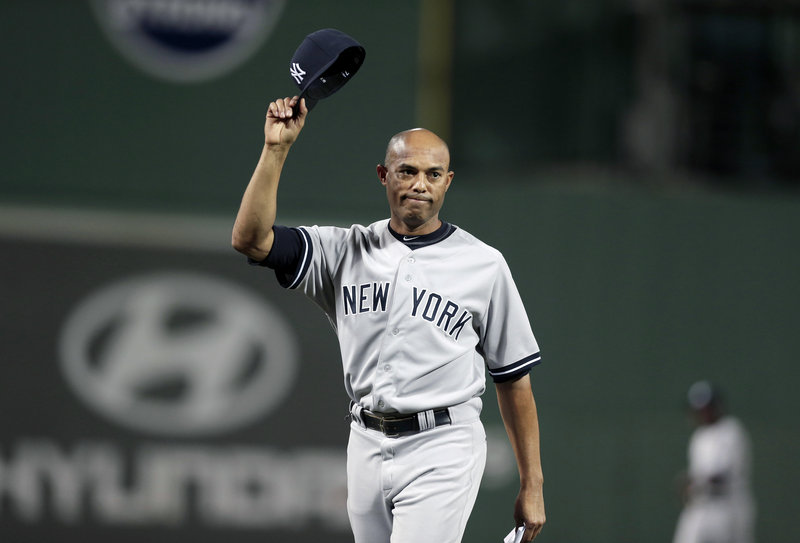 Mariano Rivera, the renowned and soon-to-retire Yankees reliever, acknowledges the crowd as his career was celebrated in a pre-game ceremony Sunday at Fenway Park.