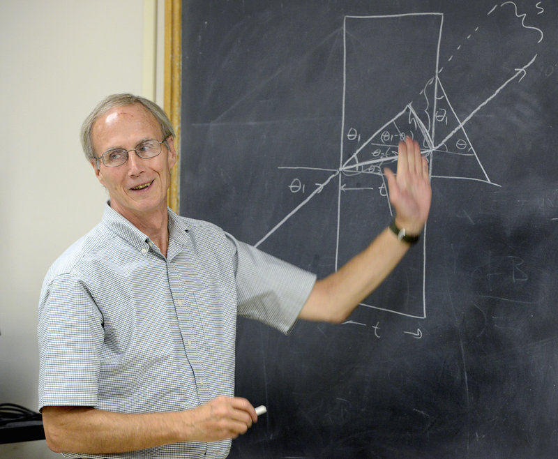 Bob Coakley teaches a physics class at the University of Southern Maine in Portland.