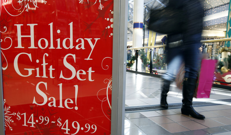 A research firm predicts stores like this one in Cambridge, Mass., will see modest revenue growth this holiday season.