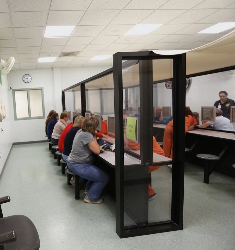 Inmates meet with visitors at the Cumberland County Jail. By creating a panel to study Maine’s unified jail system, the state is abdicating responsibility for policymaking, a reader says.