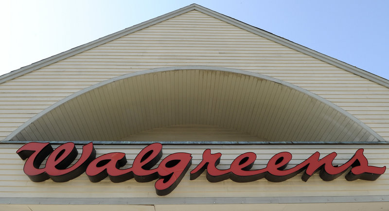 Walgreen Co. will start giving workers a contribution toward the cost of health coverage and then send them to a private insurance exchange to pick from as many as 25 plans.