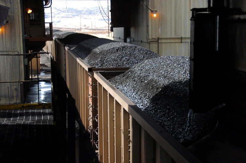Coal passes through a loading terminal earlier this year at the Spring Creek mine near Decker, Mont. U.S. coal production is on track to fall to a 20-year low in 2013.