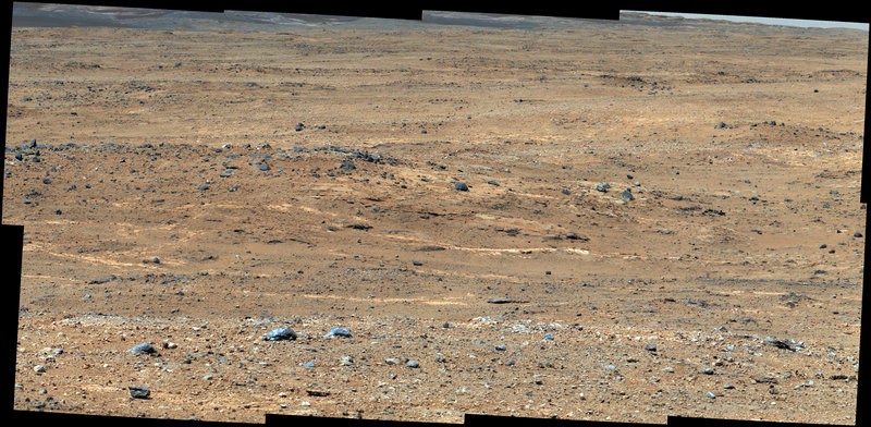 Image taken by NASA’s Curiosity rover shows a view of Gale Crater. This month, the rover reached its first rest stop on its trek toward Mount Sharp, which rises from the crater.