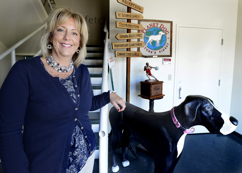 Colleen McCracken, the new co-chief executive officer of Planet Dog, is shown at the headquarters in Westbrook.