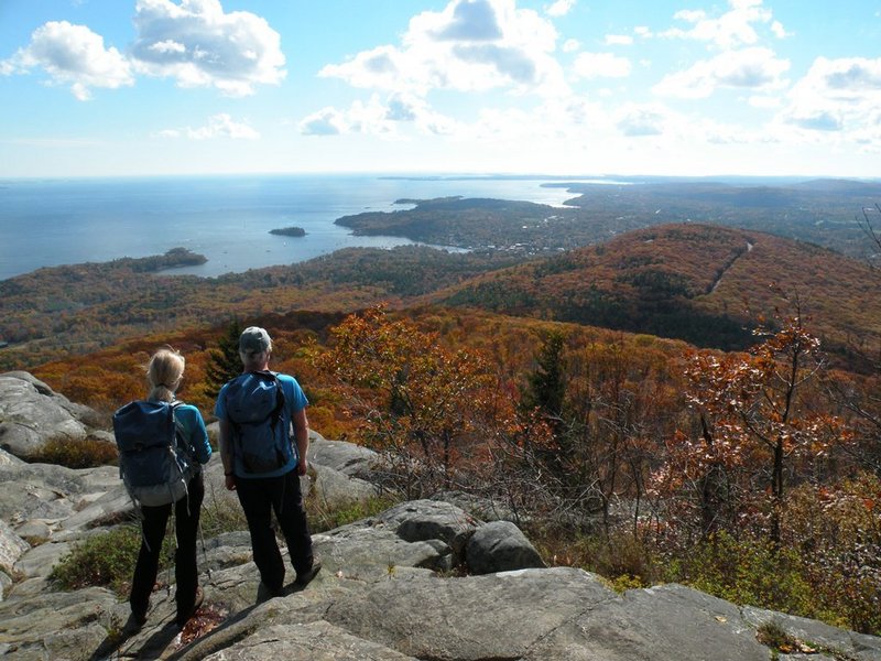 Hikers looking for great spots to view fall foliage in Maine won’t be disappointed by a trek to Ocean Lookout on Mount Megunticook in Camden Hills State Park.