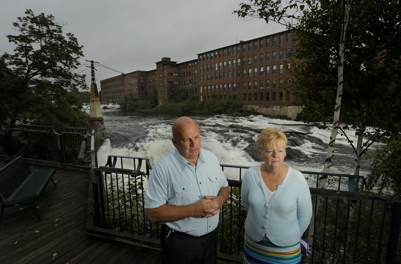 Westbrook Mayor Colleen Hilton and William Baker, assistant city administrator, talk about the economic future of Westbrook while standing in Saccarappa Park. If Westbrook can turn its downtown into an attractive place to live and work, it could replace all the jobs that were lost as paper mill employment decreased.