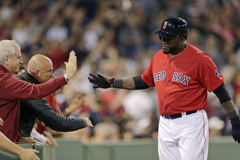 That’s right, David Ortiz shares the moment with fans after scoring a run in the seventh inning of Friday night’s 6-3 win over the Blue Jays.