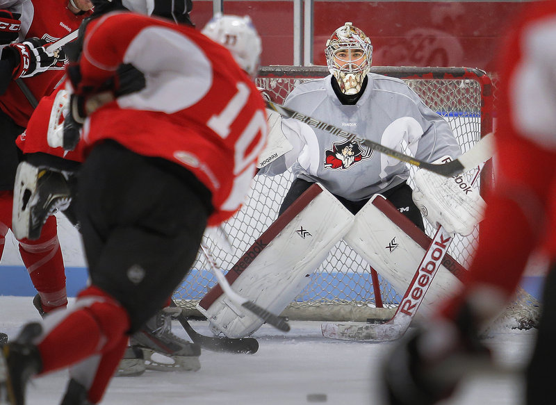 Justin Weller shoots but doesn’t score against goaltender Louis Domingue during a drill.