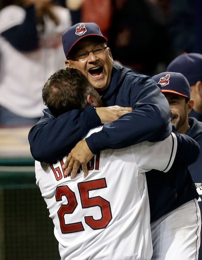 Indians Manager Terry Francona hugs Jason Giambi, who hit a two-run pinch-hit homer in the bottom of the ninth inning Tuesday to give Cleveland a dramatic 5-4 win over the Chicago White Sox.
