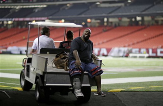 New England Patriots defensive tackle Vince Wilfork is transported out of the Georgia Dome after he was injured during the second half of Sunday’s game against the Atlanta Falcons.