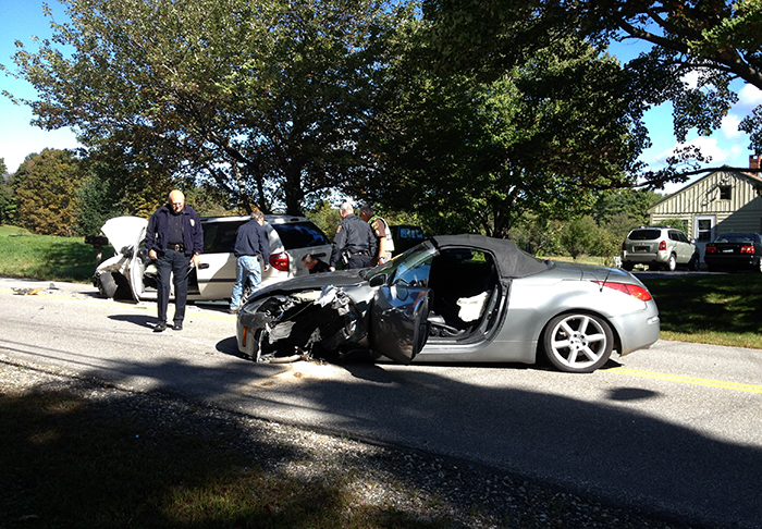 A van from Windham High School and a sports car collided on Windham Center Road around 9:30 a.m. Wednesday, injuring a student and the two drivers.