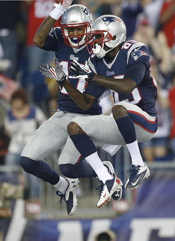 Aaron Dobson, left, celebrates his first NFL touchdown with Kenbrell Thompkins early in Thursday night’s victory over the New York Jets at Gillette Stadium in Foxborough, Mass. NFLACTION13;