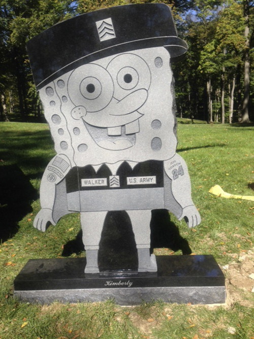 This Oct. 10, 2013, photo provided by the family of Kimberly Walker shows Walker's gravestone in the likeness of popular cartoon character SpongeBob SquarePants. Spring Grove Cemetery in Cincinnati recently removed it, saying it did not fit in with the character of the historic and picturesque cemetery.