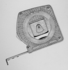 A drawing by Curtis of a tape measure is one of her renderings of household objects at the June Fitzpatrick Gallery in Portland.