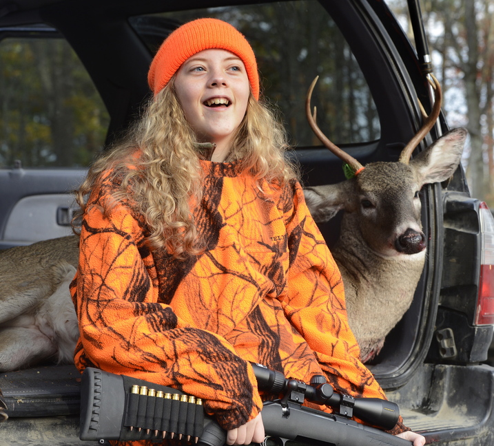 Anna Scamman, 13, of Standish recalls getting up early with her mother, Nichelle Scamman, to harvest this five-point buck on Youth Deer Hunting Day. She joined others tagging their deer at Jordan’s Store in Sebago.