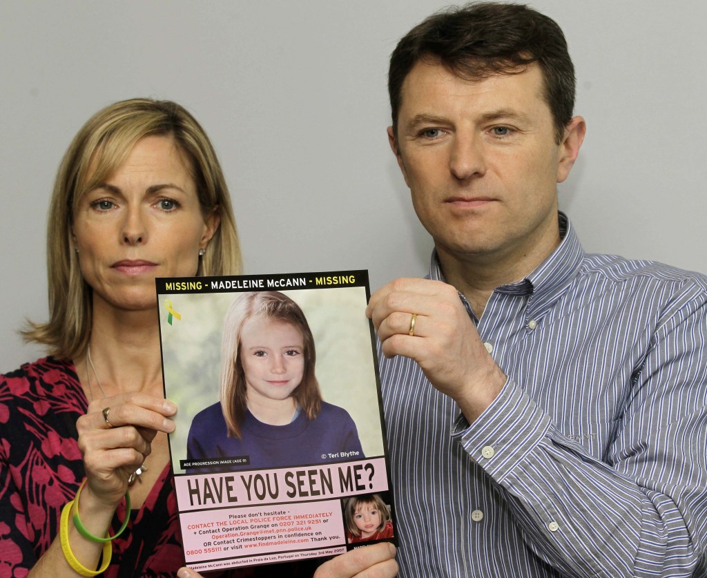 Kate and Gerry McCann hold a poster depicting an age progression of how their daughter Madeleine, who went missing in Portugal in 2007, might now look.