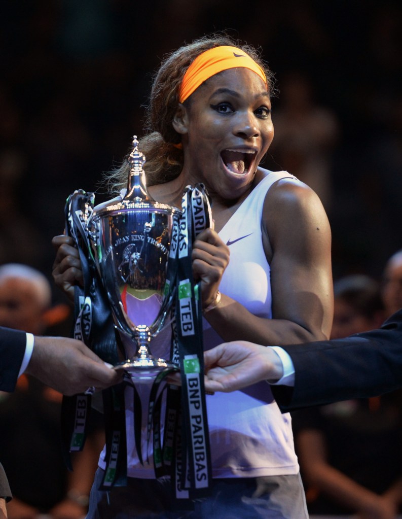 Serena Williams celebrates as she holds the trophy after her victory over Li Na of China in the final of the WTA Championship in Istanbul, Turkey, on Sunday.