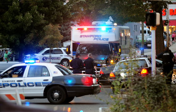 Law enforcement from local, state and federal jurisdictions investigate the residence of Miriam Carey in Stamford, Conn. Thursday, Oct. 3, 2013. Law-enforcement authorities have identified Carey, 34, as the woman who, with a 1-year-old child in her car, led Secret Service and police on a harrowing chase in Washington from the White House past the Capitol Thursday, attempting to penetrate the security barriers at both national landmarks before she was shot to death, police said. The child survived.