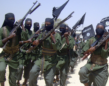 Al-Shabab fighters march with their weapons during military exercises on the outskirts of Mogadishu, Somalia, in February.
