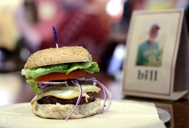 The Cousin Oliver burger features lettuce, tomato, onion and Chef Tony’s homemade pickles.