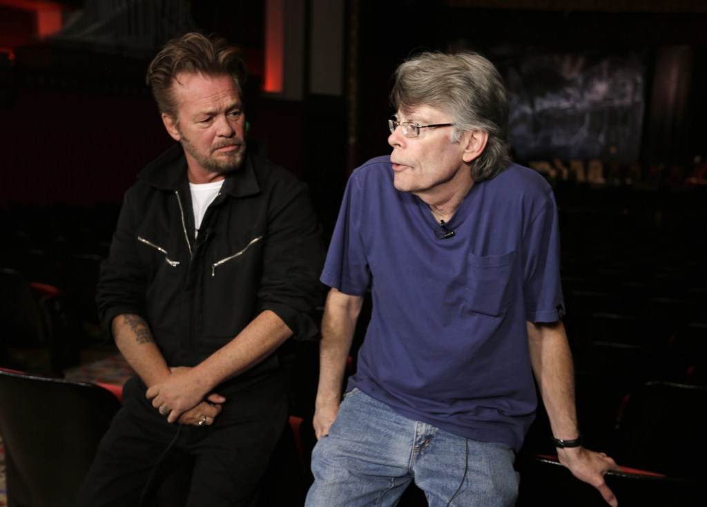 Musician John Mellencamp, left, and writer Stephen King talk about their collaboration at a press preview of the musical “Ghost Brothers of Darkland County” at the Indiana University Auditorium in Bloomington, Ind.