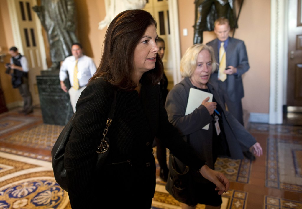 Sen. Kelly Ayotte, R-N.H., is one of 12 senators pushing both political parties toward a compromise that would reopen the government and raise the debt ceiling.