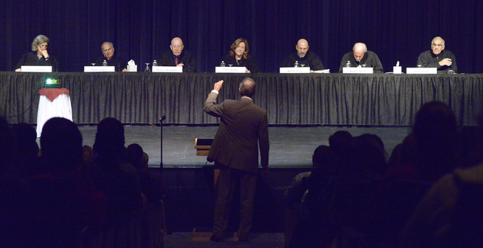 Attorney Sheldon Tepler addresses the Maine Supreme Judicial Court as it hears oral arguments at Cape Elizabeth High School. Members are, from left, Justices Ellen Gorman, Warren Silver and Donald Alexander, Chief Justice Leigh Saufley, and Justices Jon Levy, Andrew Mead and Joseph Jabar.