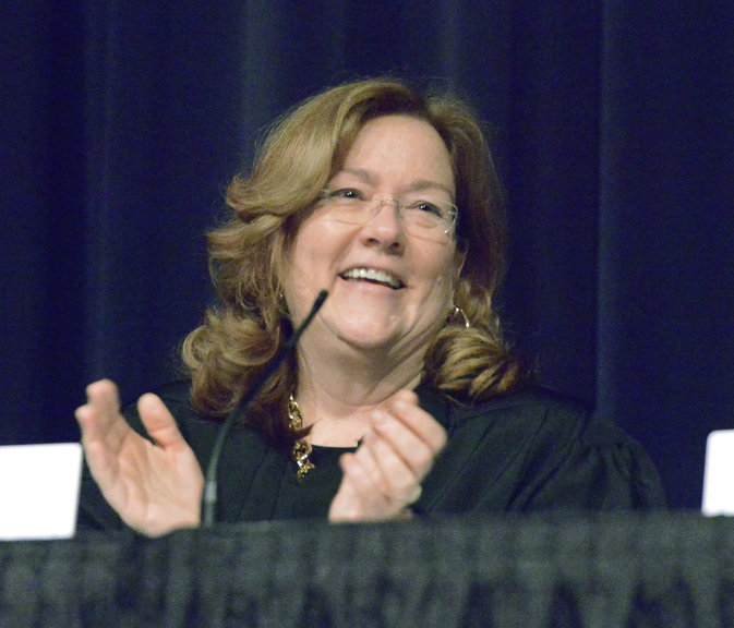 Chief Justice Leigh Saufley welcomes students and guests prior to a session of the Maine Supreme Judicial Court, during which it heard oral arguments of several cases at Cape Elizabeth High School on Wednesday.