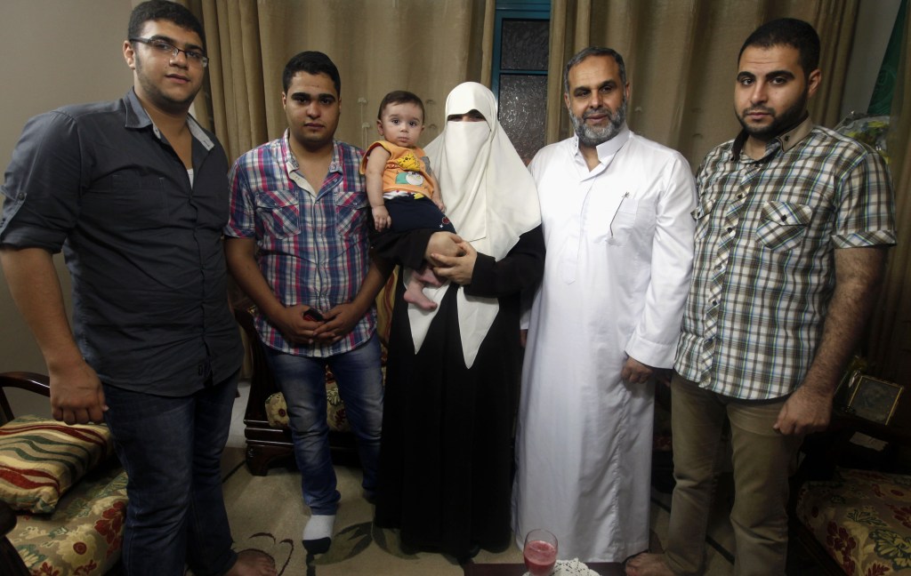 The Rantisi family gather at their house in Gaza City last June. From right are Baraa, Mohammed, Kifah, 10-month-old Mohammed, Malik, and Anaz. The family’s story illustrates the draw the Muslim Brotherhood and its search for direction today.