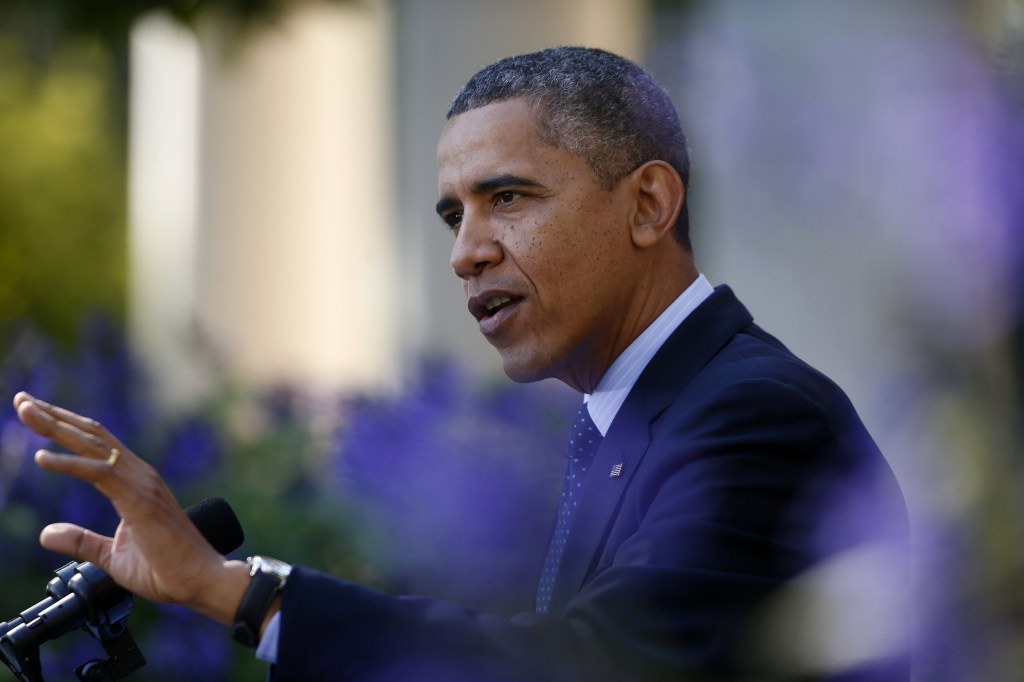 In this Oct. 21 file photo, President Barack Obama gestures while speaking in the Rose Garden of the White House in Washington on the initial rollout of the health care overhaul. Obama acknowledged that the widespread problems with his health care law’s rollout are unacceptable, as the administration scrambles to fix the cascade of computer issues.