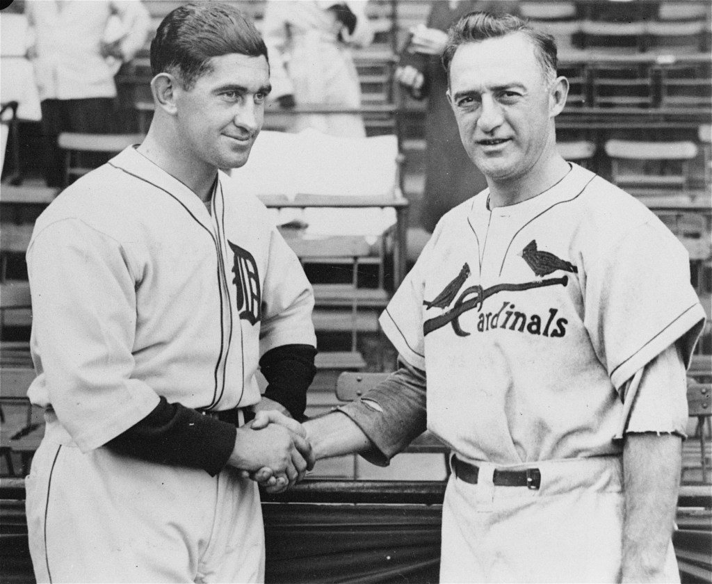 Detroit Tigers manager Mickey Cochrane, left, and St. Louis Cardinals manager Frankie Frisch shake hands before the start of the opening game of the World Series in Detroit.