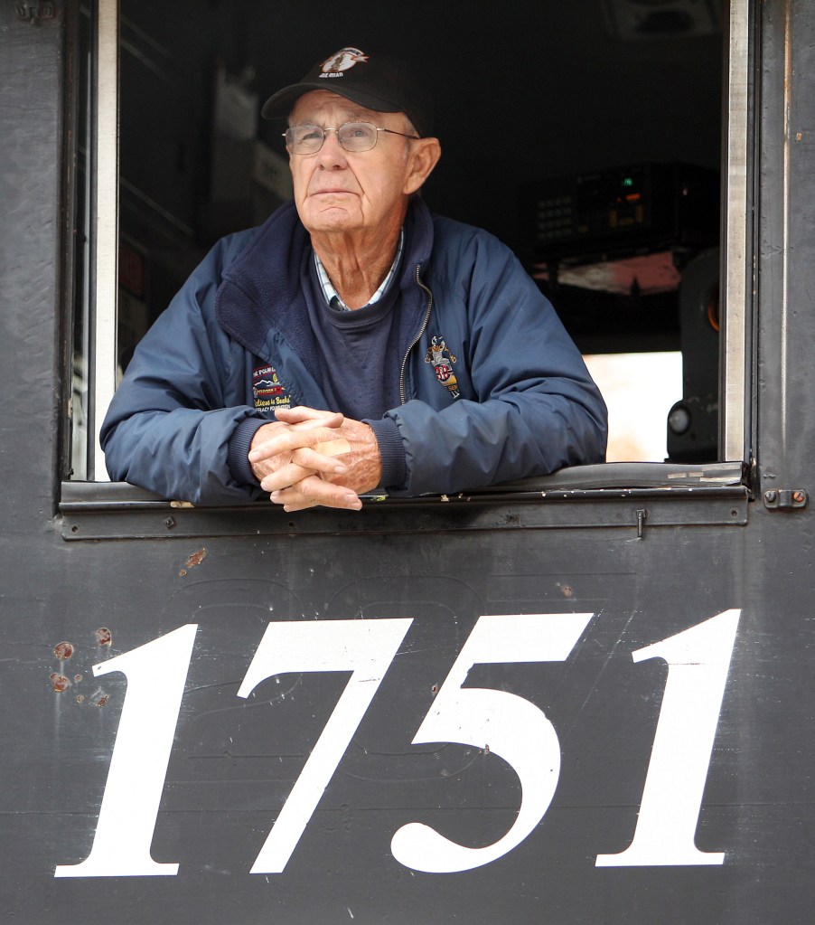 In this photo taken Wednesday Oct. 16, 2013 in North Conway, N.H., Gordon Clark, a train engineer for the Conway Scenic railroad, peers out of his window before taking tourists through the White Mountains. People in this tourist town in the mountains are left wondering what happened to missing teenager Abigail Hernandez. Nothing has been found as investigators try to find how Hernandez disappeared Wednesday Oct. 9 when she was last seen leaving school and walking towards home.