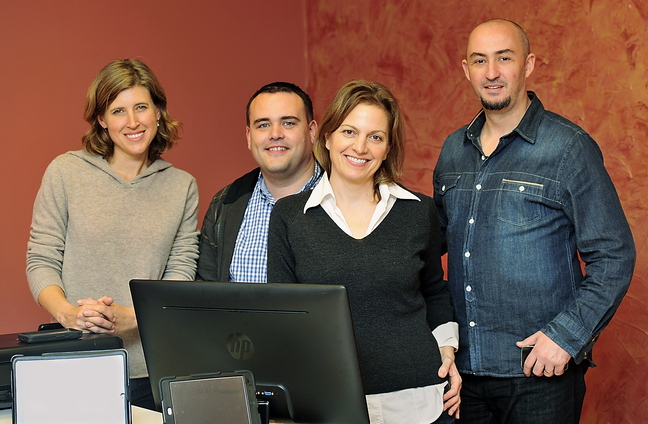 Emily Bernhard, second from right, with BizzieMe partners Julie Kingsley, John Moore and Dragos Stancu. Bernhard came to a StartUp Weekend last year – which led to the creation of her BizzieMe media venture.