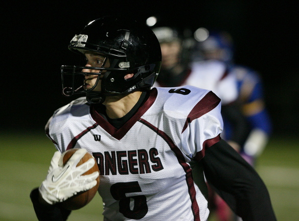 Greely's Connor Hanley runs the ball during the first period of the game against Falmouth High School Friday in Falmouth.