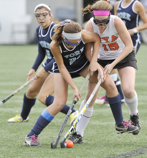York’s Lily Posternak, left, battles to control the ball with NYA’s Olivia Madore during York’s 4-0 win at Yarmouth on Tuesday. NYA’s two losses have been to York and Falmouth.