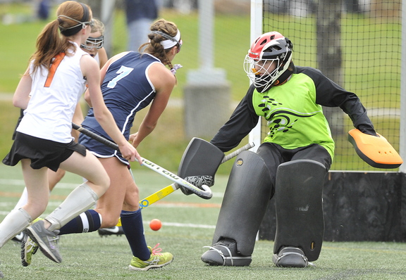 York’s Taylor Simpson, 7, slips the ball past NYA goalie Elizabeth Coughlin for the first of her three goals in a convincing 4-0 win over North Yarmouth Academy at Yarmouth on Tuesday.
