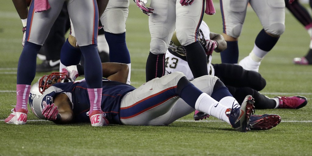 New England Patriots outside linebacker Jerod Mayo lies injured during Sunday’s game in Foxborough, Mass. Mayo’s loss is all the more significant because of the leadership he provided on the team.