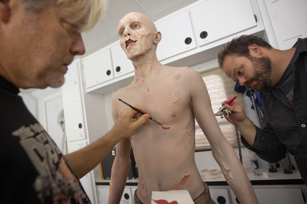 Kevin Galbraith undergoes a three-hour make-up session to transform into his zombie character recently on the set of “The Walking Dead,” in Senoia, Ga.